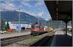 The SBB Re 420 252-9 wiht a mail-train in Giubiasco.