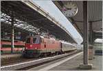 The SBB Re 4/4 II 11194 wiht his  Dispozug  in Lausanne.