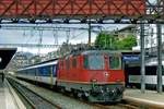 On a rainy 26 September 2010 SBB 11206 calls at Neuchatel.