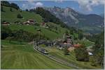 The BLS Re 4/4 II 501 with his RE from Zweismmen to Interlaken Ost by Garstatt.