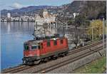 The SBB Re 4/4 II 11290 (Re 420 290-9) near the Castle of Chillon on the way to Lausanne.