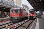 The SBB Re 4/4 II 11116 (Re 91 85 4 420 116-6 CH-SBB) and the SBB RABe 523 111 in Lausanne.

08.12.2021