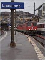 The SBB Re 4/4 II 11256 (91 85 4420 256-0 CH-SBBC) and Re 4/4 II 11340 (91 85 4420 340-2 CH-SBBC) in Lausanne.