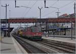 The SBB Re 4/4 II 11167 (Re 420 167-2) and an other one with a Cargo train in Neuchâtel.