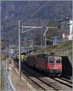 The SBB Re 4/4 II 11258 (Re 420 258-6) wiht a Cargo Train by Villeneuve.