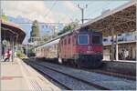 The SBB Re 4/4 II 11267with a special service in Vevey: Re 420 91 85 4420 267-7 CH-SBBC,   Le Salon Bleu  ARmz 61 85 88-90 200-6 CH-IRIS and  Le Diamant Bar  WRm 61 85 88-94 003-4 CH-IRIS.