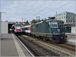 The SBB Re 4/4 II 11161 wiht his IC to Singen is arriving at Schaffhausen.
