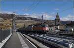 Works in the Cully Station: A SBB Re 4/4 II with a Cargo train is arriving at the plattform 3, the plattform 2 is closed.