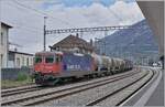 The SBB Re 4/4 II 11288 (Re 420 288-3)  AVANTI TUTTA!  is waiting in Martigny with its local freight train for departure.