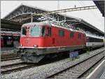 The SBB Re 4/4 II 11136 (UIC Re 420 91 85 4 420 136-4 SBB-CH) and another Re 4/4 II, not visible here, are standing with a test train on track 2 in Lausanne.

June 27, 2025