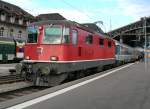 The Re 4/4 II 11132 with a special train to Lourdes in Lausanne. 
20.05.2010