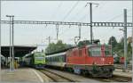 Re 4/4 II with a local train to Yverdon and a NINA to Murten wait in Payerne the departure time. 
06.09.2010