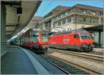 Re 4/4 II 11109 and Re 460 015-6 im Lausanne. 
01.08.2011