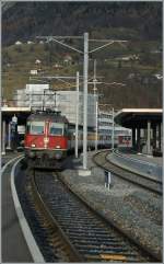 Re 4/4 II 11151 with a RE St Gallen - Chur by his stop in Sargans.