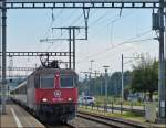 The SBB Cargo Re 421 378-1 is entering into the station of Gossau SG on September 14th, 2012.