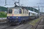 IRSI 11387 hauls an extra train through Pratteln on a rainy 14 May 2026.