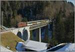 The BLS Re 4/4 193  Grenchen  with the BLS Goldenpass RE 3118 from (Montreux) - Zweisimmen - Interlaken - (Luzern) near Weissenburg.