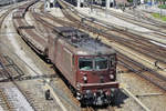 Enough fuel for sailing ships carries this train with BLS 177 through Spiez on 5 June 2014.