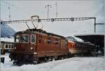 The BLS Re 4/4 169  Bönigen  with his EC  Thunersee  in Interlaken Ost.

analog picture / jan. 1995