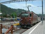 The BLS Re 4/4 192  Spiez  with a  GoldenPass  RE to Interlaken in Zweisimmen.