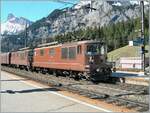 The BLS Re 4/4 187 and an other one with a Cargo train in Kandersteg.