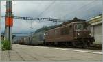 BLS Re 4/4 171 and two Re 465 with a cargo train in Spiez.