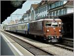 BLS Re 4/4 195 is heading a local train in Thun on August 4th, 2008.