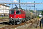SBB 11350 hauls a tank train through Pratteln on 14 September 2011.