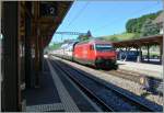 SBB Re 460 038-3 with an IC to St Gallen runs without stop trough the in Puidoux-Chexbres Station.