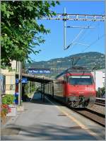 SBB Re 460 087-0 with an IR in La Tour de Peilz.