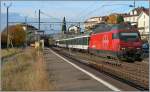 The SBB Re 460 064-9 with his IR in Rivaz.