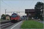 The SBB Re 460 094-6 with the IR 1707 in Roches VD.