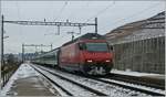 A SBB Re 460 is arriving with his IR at Villette VD.