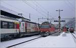 The SBB Re 460 058-1 is leaving with his IR from Sion.