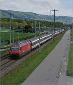 The SBB Re 460 014-4 and an other one with an IC St Gallen Geneva Airport near Gland.