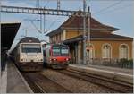 The SBB Re 460 035-9 an a RBDe 560 in Morges.