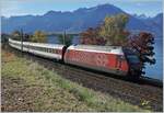 The SBB Re 460 004-5 with an IR on the way to Geneva-Airport near Villeneuve. 

24.10.2017