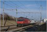 The SBB Re 460 091-2 with an IR90 on the way to Geneva Airport in Coppet.