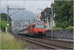 The SBB Re 460 032-6 wiht an IR90 to Geneva Airport by Montreux.