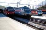 Ge 4/4 III no 651  Glacier Express  RhB; 460 024-3  Zugkraft Aargau  and 460 061-5 both SBB at Chur, August 31st, 2006. 