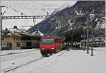 The SBB Re 460 097-9 with an IR in St-Maurice.