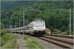 The SBB Re 460 071-4  Helvetia  with a IR 90 on the way to Brig by St-Maurice.