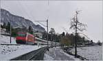 There is not very often snow on the laksite by Villenveuve: A SBB Re 460 with an IR90 on the way to Brig.