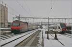 A SBB Re 460 with his IR15 on the way from Luzern to Geneva Airport in Romont.

22.12.2021