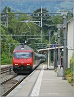 A SBB Re 460 with his IR 90 from Brig to Geneva Airport in Burier.