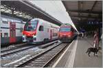 The new SBB RABe 512 008 (94 85 0 512 008-9 CH-SBB) on a test run  and a SBB Re 460 with IR15 on the way to Luzern in Lausanne.