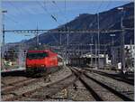 A SBB Re 460 reaches Martigny train station with its IR 90 from Brig to Geneva.