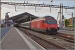 An SBB Re 460 leaves Lausanne with its HVZ IR 90 towards Geneva.