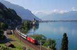 Re 460 with Interregio-Train on 29.06.2009 in Veytaux-Chillon. In the Backgrund is the Chillon-Castle