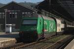 Swisstainable (...) advertiser 460 010 enters Olten on 19 May 2025, pushing a Basel bound IC service.